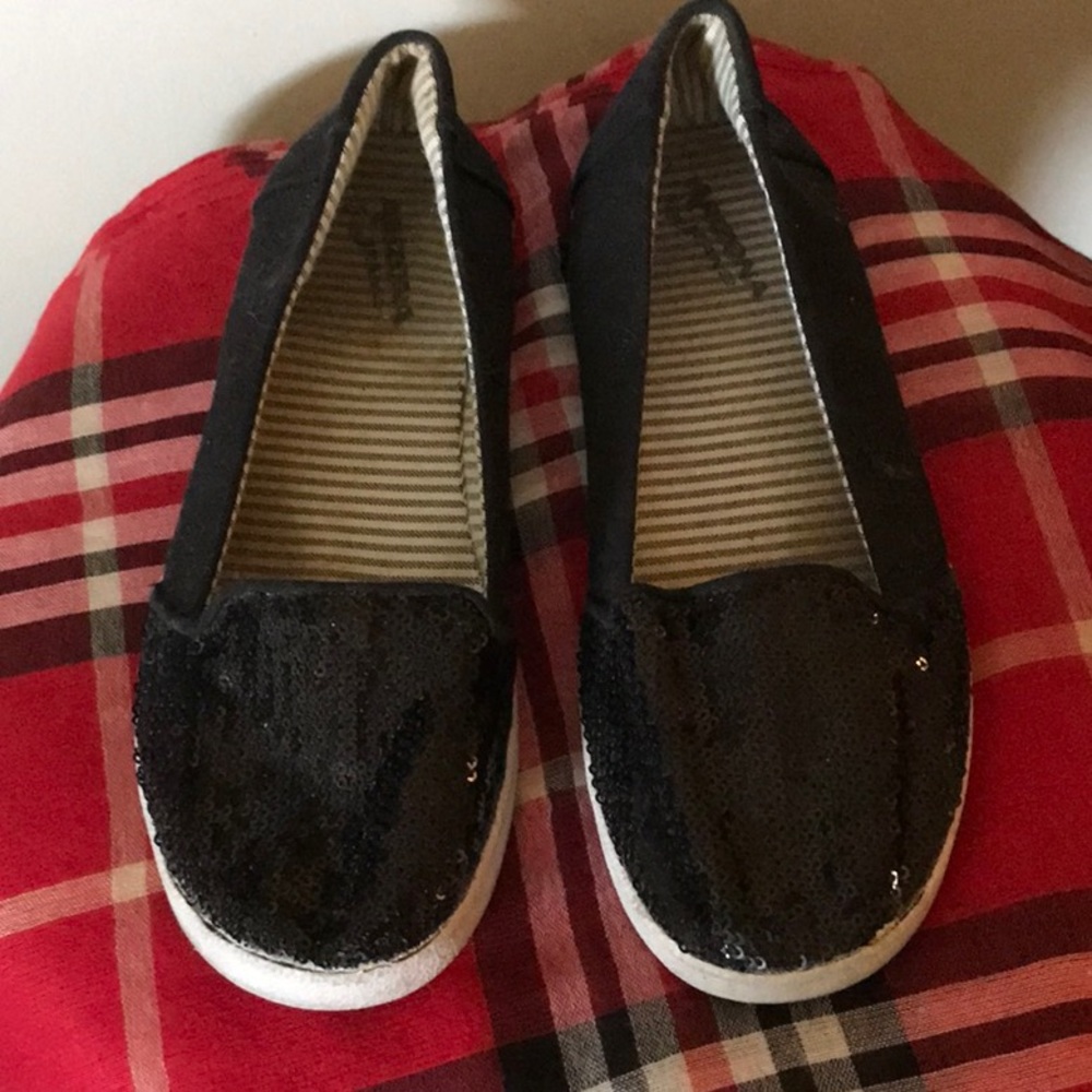 Great little black canvas style flats with black sequin covered toes. Size 6.5